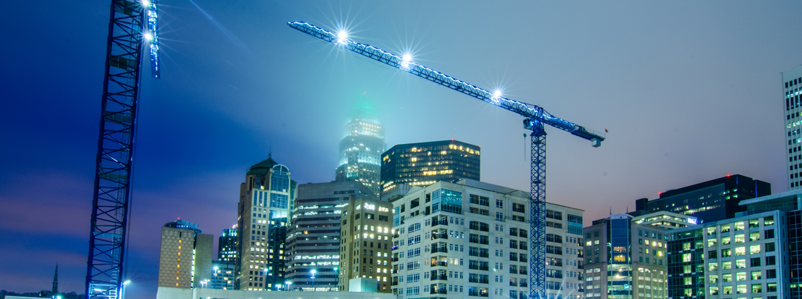 Calendar Category - Building Development Commission Cranes and scaffolding working on high-rises in Uptown Charlotte.